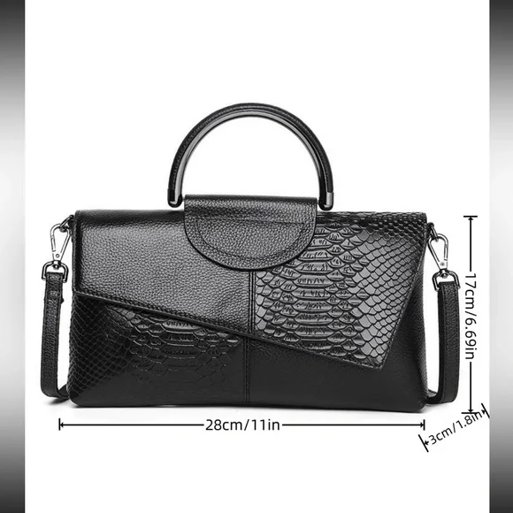 Black snakeskin print vegan leather clutchcrossbody bag